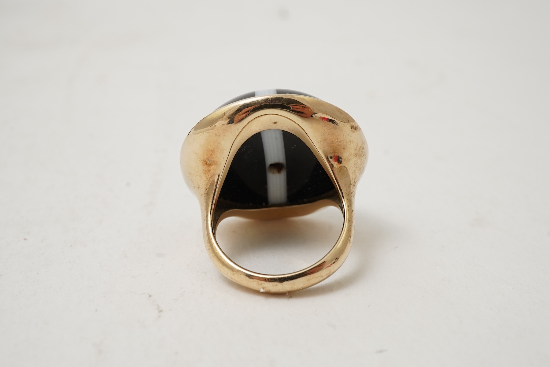 An onyx dress ring and pair of earrings